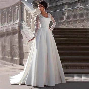 Скромные атласные свадебные платья трапециевидной формы с кружевной аппликацией, V-образный вырез, прозрачная спинка, длинный рукав Для женщин, платье принцессы Де Нойва